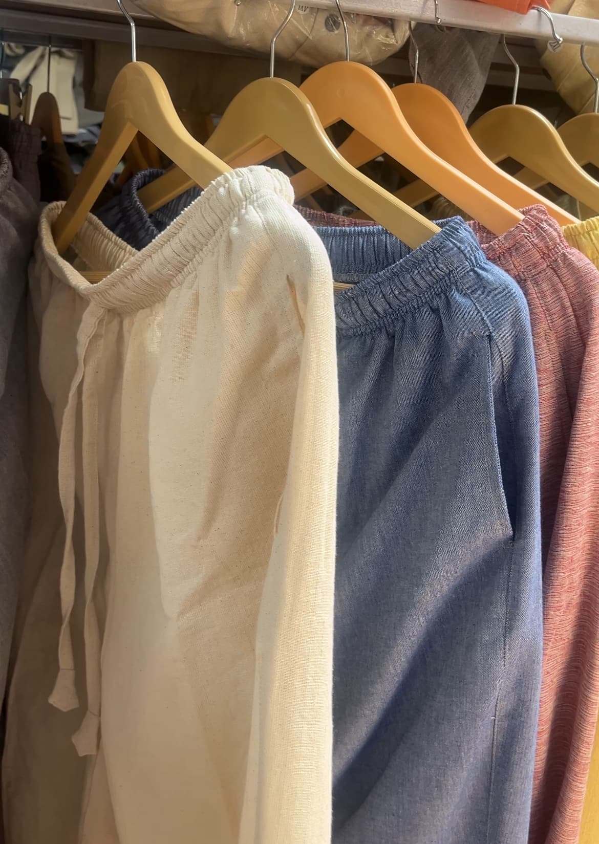 Hempko trousers hanging on a rack